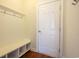 Functional mudroom with bench, cubbies, and coat hooks at 2117 Mirabel Ct., North Myrtle Beach, SC 29582