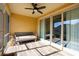 Relaxing screened porch with ceiling fan and tiled floor at 2117 Mirabel Ct., North Myrtle Beach, SC 29582