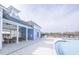 Community clubhouse with covered patio, seating, and access to the pool at 2155 Gooseberry Way, Longs, SC 29568