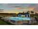 Community pool with cabana at sunset at 2155 Gooseberry Way, Longs, SC 29568