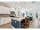 Bright kitchen with white cabinets, granite countertops, and a center island perfect for entertaining at 2404 Thoroughfare Dr. # 2404, North Myrtle Beach, SC 29582