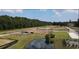 Aerial view of community with playground and pond at 261 Christiana Ln. # B, Myrtle Beach, SC 29579