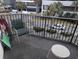 Balcony with chairs and small table at 2611 Ocean Blvd. S # 305, Myrtle Beach, SC 29577