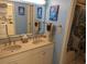 Clean bathroom with double sinks and shower/tub at 2611 Ocean Blvd. S # 305, Myrtle Beach, SC 29577