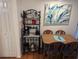 Bright dining area with table and chairs, coffee bar, and artwork at 2611 Ocean Blvd. S # 305, Myrtle Beach, SC 29577