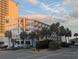 Oceanfront building with palm trees and parking at 2611 Ocean Blvd. S # 305, Myrtle Beach, SC 29577