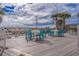 Oceanfront patio with tables and chairs for outdoor dining at 2801 S Ocean Blvd. S # 241, North Myrtle Beach, SC 29582