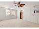 Cozy bedroom with wood paneled walls and neutral carpeting at 316 N Highland Ave., Myrtle Beach, SC 29577