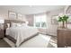 Spacious main bedroom with a king-size bed and neutral color palette at 321 Bent Green Ct. # 84A, Murrells Inlet, SC 29576