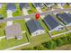 Aerial view of a well-maintained home with a large backyard in a quiet neighborhood provides an overview of the property at 352 High Falls Dr., Conway, SC 29526