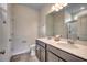 Modern bathroom with double sink vanity, large mirror, and tiled floor at 352 High Falls Dr., Conway, SC 29526