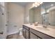 Bathroom with double vanity, large mirror, and shower at 352 High Falls Dr., Conway, SC 29526