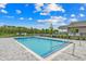 A refreshing community pool with a paved deck and clear blue water, perfect for relaxation at 352 High Falls Dr., Conway, SC 29526