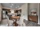 Open concept kitchen and dining area with stainless steel appliances and hardwood flooring at 352 High Falls Dr., Conway, SC 29526