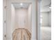 Bright hallway features a modern vinyl floor transitioning to a carpeted living space beyond at 352 High Falls Dr., Conway, SC 29526