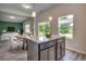 Kitchen island with granite countertop, seating, and views of the living area at 352 High Falls Dr., Conway, SC 29526