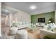 Living room with white sofas and a green accent wall at 352 High Falls Dr., Conway, SC 29526