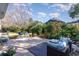 Enjoy this serene backyard patio with comfortable seating at 402 Ocean Pointe Ct., North Myrtle Beach, SC 29582