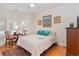 Bright bedroom with hardwood floors and bay windows at 402 Ocean Pointe Ct., North Myrtle Beach, SC 29582