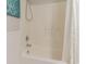 Bathroom with shower/tub combo and white accents at 4384 Daphne Ln. # H, Murrells Inlet, SC 29576