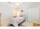 Bright bedroom with a twin bed, nightstand, and double door closet at 4384 Daphne Ln. # H, Murrells Inlet, SC 29576