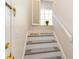 Interior staircase with white risers and gray carpet at 4384 Daphne Ln. # H, Murrells Inlet, SC 29576