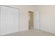 Bedroom with double-door closet and access to another room at 4432 Montrose Ln. # H, Myrtle Beach, SC 29579