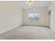 Bright bedroom with neutral carpeting and a ceiling fan at 4432 Montrose Ln. # H, Myrtle Beach, SC 29579