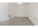 Empty bedroom with neutral walls and carpeting at 4432 Montrose Ln. # H, Myrtle Beach, SC 29579