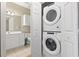 Stackable washer and dryer in a closet-style laundry room at 4432 Montrose Ln. # H, Myrtle Beach, SC 29579