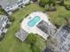 Aerial view of community pool and spa with surrounding green space at 4432 Montrose Ln. # H, Myrtle Beach, SC 29579