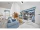 Bright living room with sliding glass doors leading to a balcony at 4434 Little River Inn Ln. # 205, Little River, SC 29566