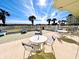 Outdoor patio area with seating and ocean views at 4505 S Ocean Blvd. S # 1-E, North Myrtle Beach, SC 29582