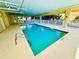 Community pool with covered patio and safety features at 4505 S Ocean Blvd. S # 1-E, North Myrtle Beach, SC 29582