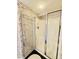 Walk-in shower with glass enclosure at 4505 S Ocean Blvd. S # 1-E, North Myrtle Beach, SC 29582