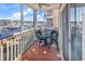 Relaxing balcony with marina views and seating for two at 4625 Lightkeepers Way # 7-H, Little River, SC 29566