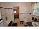 Clean bathroom with black and white tile, bathtub, and toilet at 4819 Walnut St., Loris, SC 29569