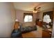 Bright bedroom with queen-size bed and ceiling fan at 4819 Walnut St., Loris, SC 29569