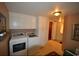 Laundry room with washer, dryer, and cabinets at 4819 Walnut St., Loris, SC 29569