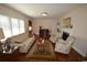 Living room featuring hardwood floors, fireplace, and comfy seating at 4819 Walnut St., Loris, SC 29569