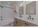 Modern bathroom with double vanity, quartz countertop, and a shower/tub combo at 4887 Luster Leaf Circle # 404, Myrtle Beach, SC 29577