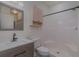 Clean bathroom with single vanity, shower, and a linen cabinet at 4887 Luster Leaf Circle # 404, Myrtle Beach, SC 29577