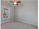 Bright bedroom with window, ceiling fan, and neutral-colored walls at 4887 Luster Leaf Circle # 404, Myrtle Beach, SC 29577