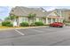 Community clubhouse with parking and landscaping at 4887 Luster Leaf Circle # 404, Myrtle Beach, SC 29577