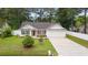 Charming one-story home with well-maintained lawn and an attached two-car garage at 5933 Rahnavard Blvd., Myrtle Beach, SC 29588