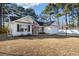 Inviting single-story home showcasing a cozy facade and neat landscaping at 5933 Rahnavard Blvd., Myrtle Beach, SC 29588