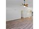 Spacious living room featuring wood floors, neutral walls, and an elegant ceiling fan at 5933 Rahnavard Blvd., Myrtle Beach, SC 29588