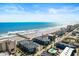 Aerial view of oceanfront property, highlighting building and beach access at 6000 N Ocean Blvd. # 317, North Myrtle Beach, SC 29582