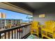 Balcony with yellow chairs and ocean view at 6000 N Ocean Blvd. # 317, North Myrtle Beach, SC 29582