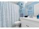 Clean bathroom with white vanity and blue accents at 6000 N Ocean Blvd. # 317, North Myrtle Beach, SC 29582